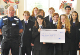 Receiving a donation from the Sussex Police Property Fund
